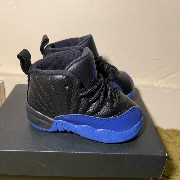 Jordan 12 Retro
Black Game Royal
(TD) Worn once to a birthday party - Picture 2 of 6